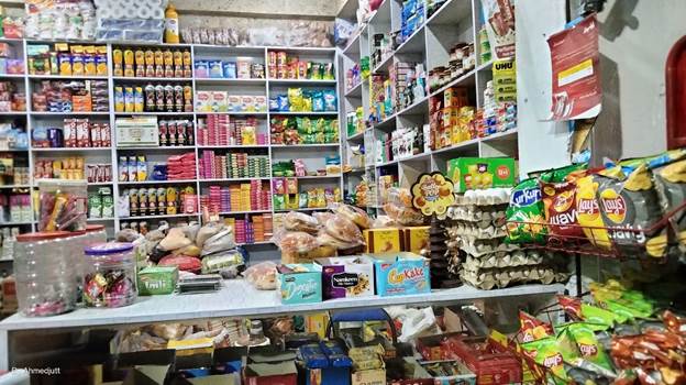 A store with shelves full of food

Description automatically generated