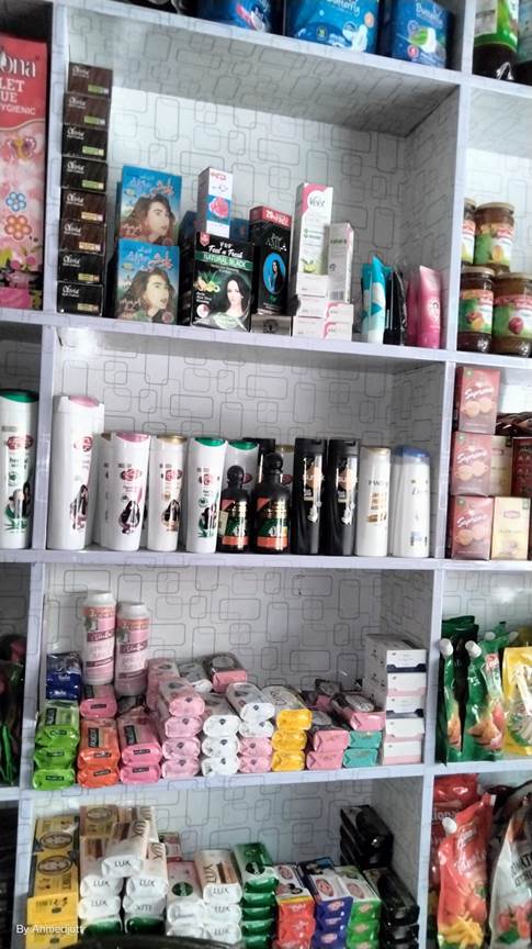 Shelves of shelves with different products

Description automatically generated with medium confidence